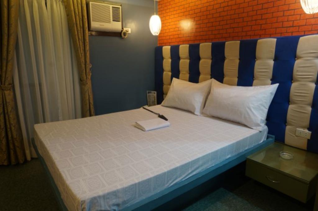 Icon Hotel Manila Bilik gambar